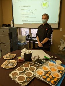 Chef Kasey Wesley with some of the contest dishes